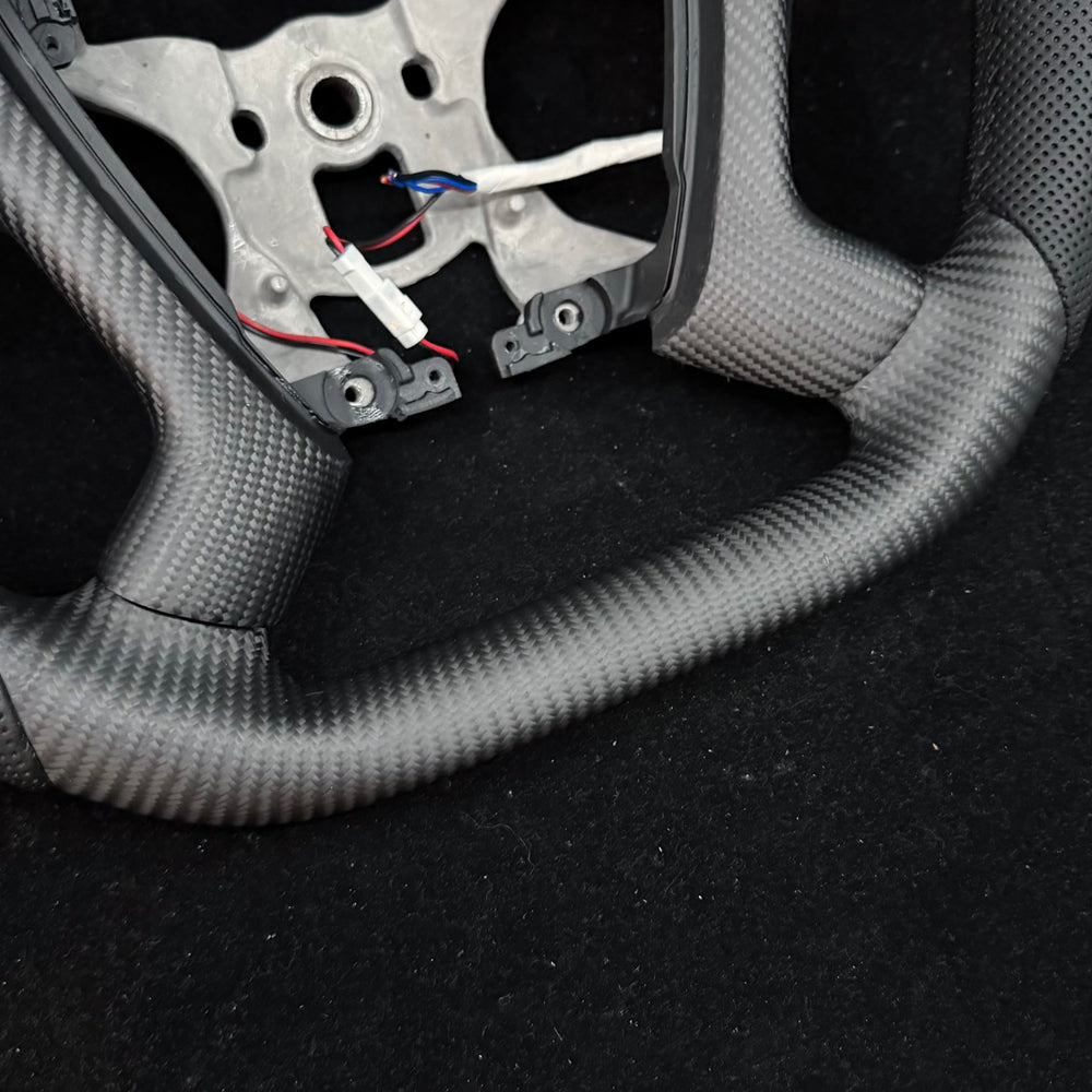 IN STOCK - 2007-2014 Chevrolet Silverado/Tahoe/GMC Sierra/Yukon/Cadillac Escalade Heated Carbon Fiber Steering Wheel